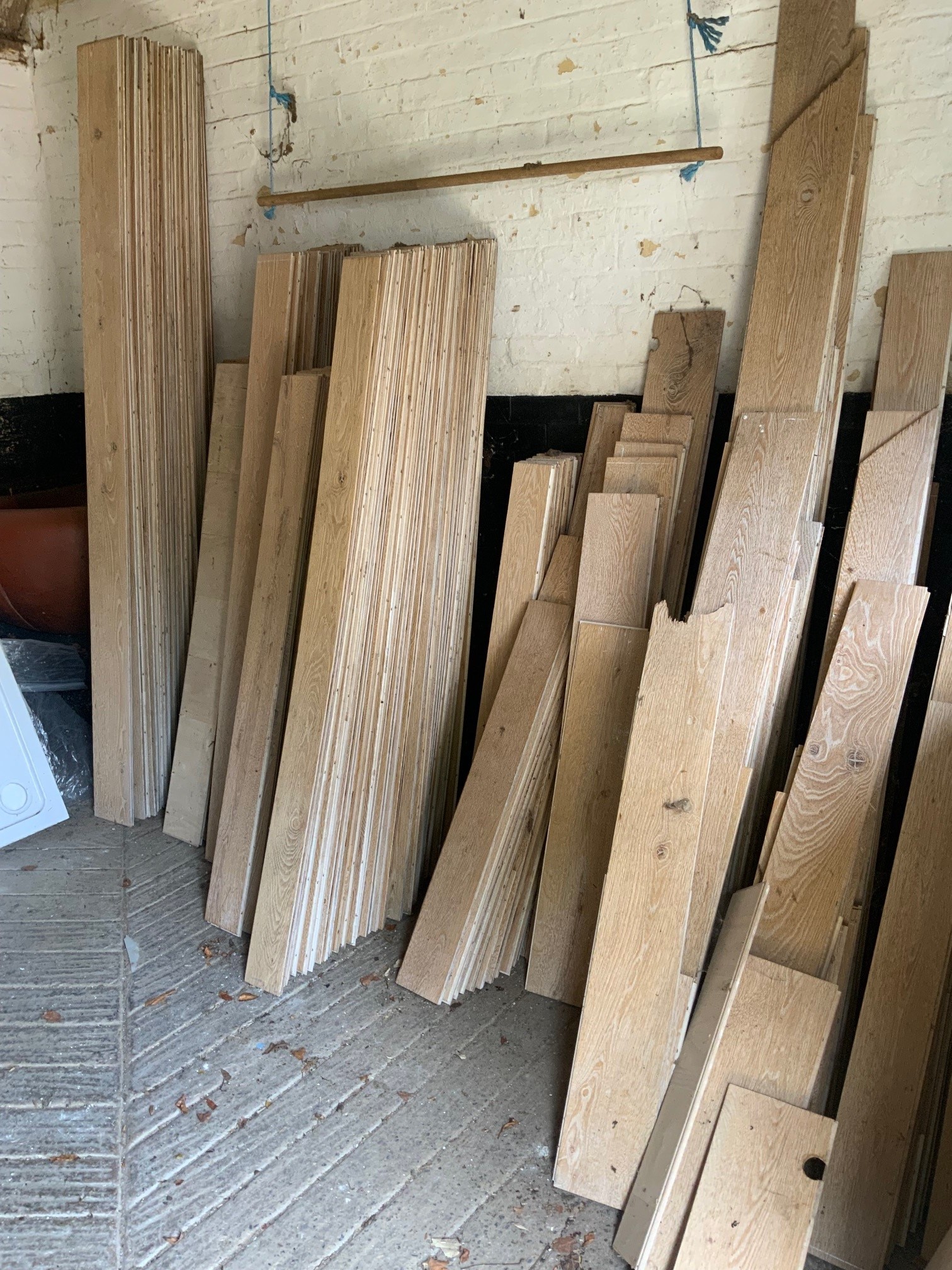 A quantity of engineered light oak floor boarding of various lengths, widths mainly 19cm and 13cm, all 1.5cm thick. As previously fitted to four rooms - 679 x 633cm; 551 x 367cm; 437 x 396cm and 376 x 321cm (approx. 93.